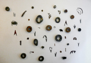 The Point of Water, Gallery 128, New York City, 8 feet x 7 feet x 5 inches, steel, 2008 ||| Composed of fabricated & recycled steel objects. In Bamana thought, along with north, south east & west, water is the 5th cardinal point. Water determines where villages are located. Circles symbolize water. Ellipses can symbolize a body of water.