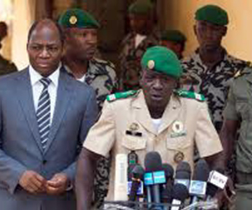 Amadou Haya Sanogo, the leader of the mutiny accompanied by Djibril Bassole, the Burkina Faso Foreign Affairs Minister.
